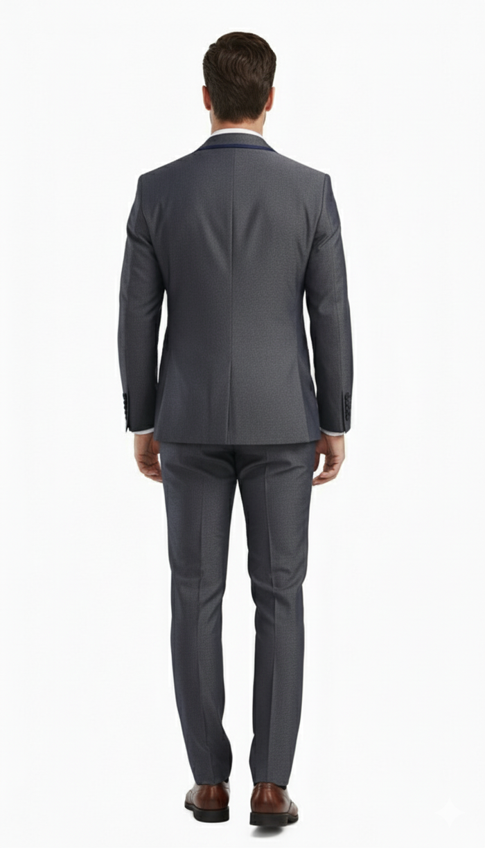 Charcoal gray men's three-piece suit. Subtle textured fabric with blue trim. Slim fit: tailored jacket, matching trousers, and vest. Modern silhouette.
