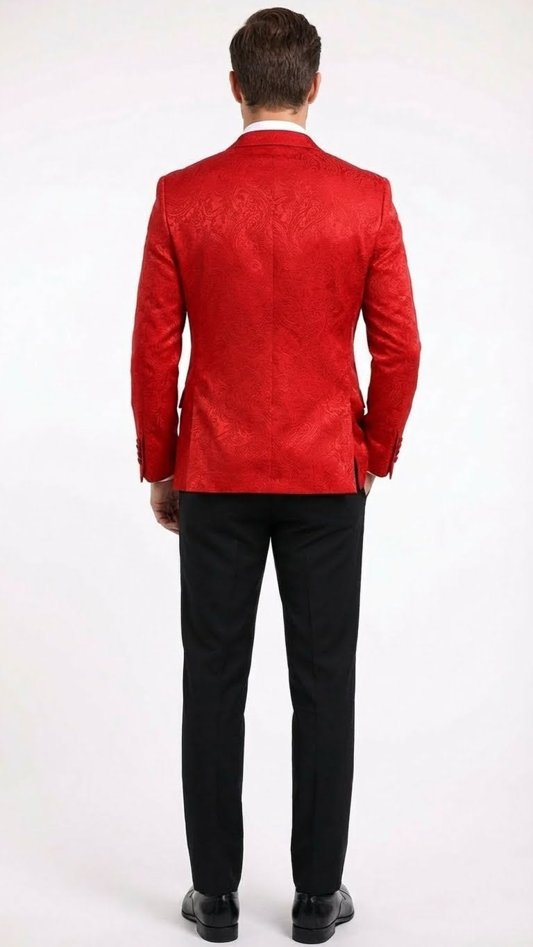 Men's red velvet blazer with paisley pattern. Fitted, single-breasted, long sleeves. Soft, plush fabric, side vents, and tailored shoulders for enhanced fit. Vibrant red color.
