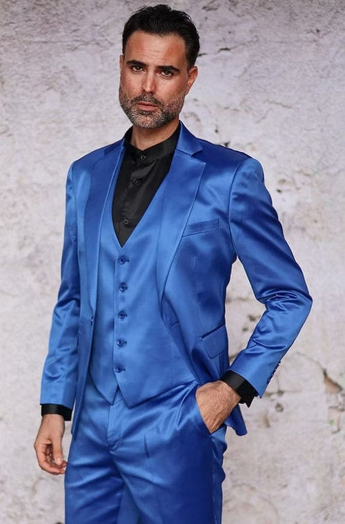 Royal blue satin three-piece slim fit suit for men. Features blazer (notch lapel, single-button), vest, and tailored trousers (flat front, belt loops). Shiny fabric & modern silhouette.
