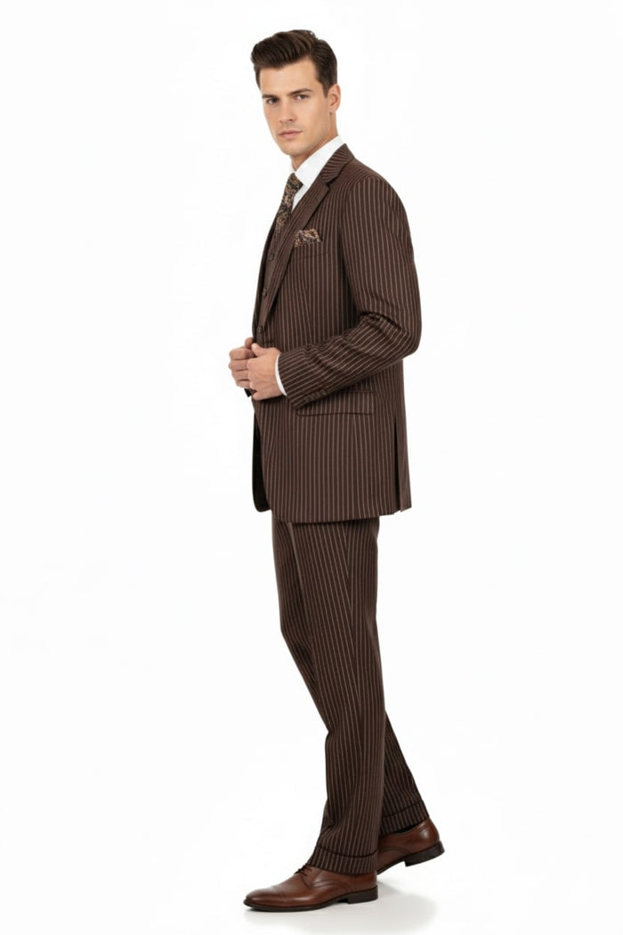 Men's brown pinstripe 3-piece suit: fitted jacket with wide lapels, single-breasted, pocket square. Straight-leg trousers. Textured fabric, formal style.