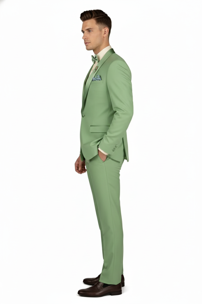 Men's mint green tuxedo: tailored, single-breasted jacket, structured shoulders, slim-fit pants. Smooth texture. Includes matching bow tie and pocket square. Formal elegance.
