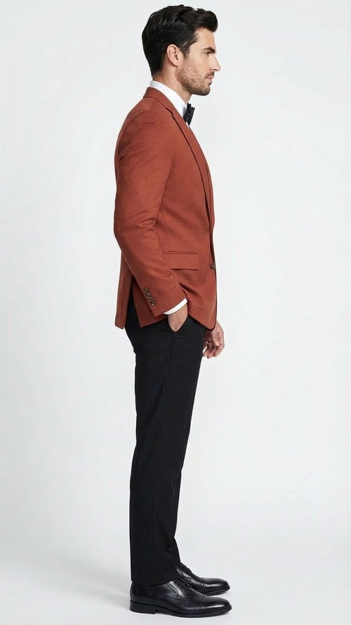 Alberto Nardoni men's brick copper rust blazer. Fitted, single-breasted, notched lapels, two pockets. Textured fabric, structured silhouette, buttoned cuffs.
