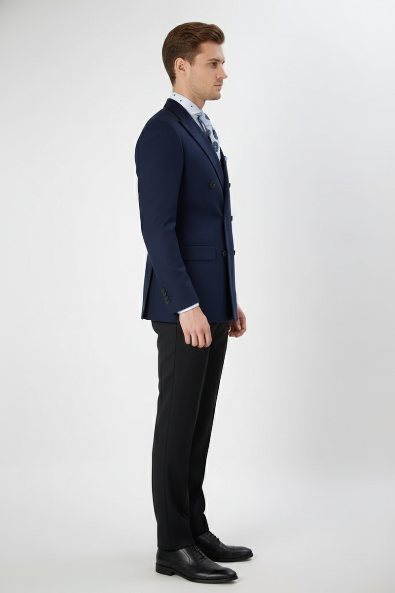 Alberto Nardoni men's navy double-breasted blazer. Tailored fit, structured shoulders, notch lapel. Smooth fabric, buttoned cuffs, flap pockets. Classic suit silhouette.
