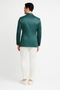 Men's teal green floral jacquard blazer. Slim fit, structured shape with tonal floral pattern. Notched lapels, long sleeves, waist length. Smooth fabric with slight sheen.
