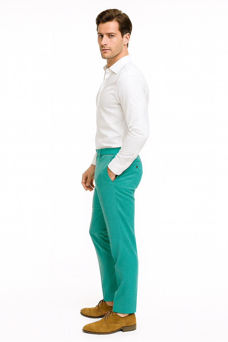 Men's slim-fit aqua dress pants. Vibrant turquoise color with subtle sheen. Sleek silhouette, smooth texture. Classic design with front pockets and single-button waist detail.
