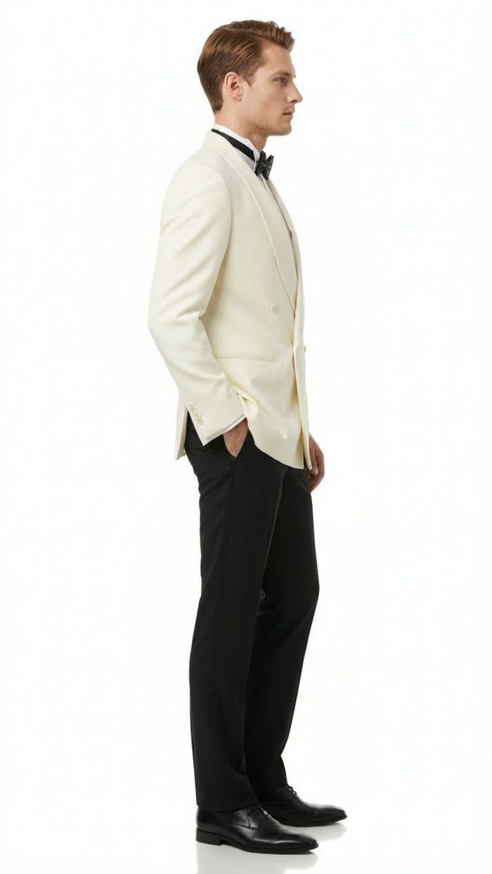 Ivory double-breasted tuxedo jacket with shawl lapels. Structured fit, smooth fabric, and long sleeves. Ideal for formal events, paired with black trousers.
