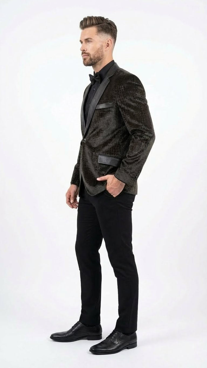 Alberto Nardoni men's blazer. Exotic crocodile/alligator skin texture in black with a slight sheen. Single-breasted, notched lapels, two pockets. Black satin lapel/pocket details enhance the structured silhouette.

