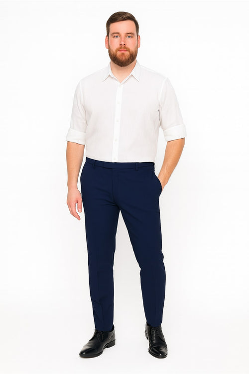 Men's white linen button-down shirt. Long sleeves rolled up, classic collar, and straight cut. Lightweight, breathable linen. Solid white with a button placket.
