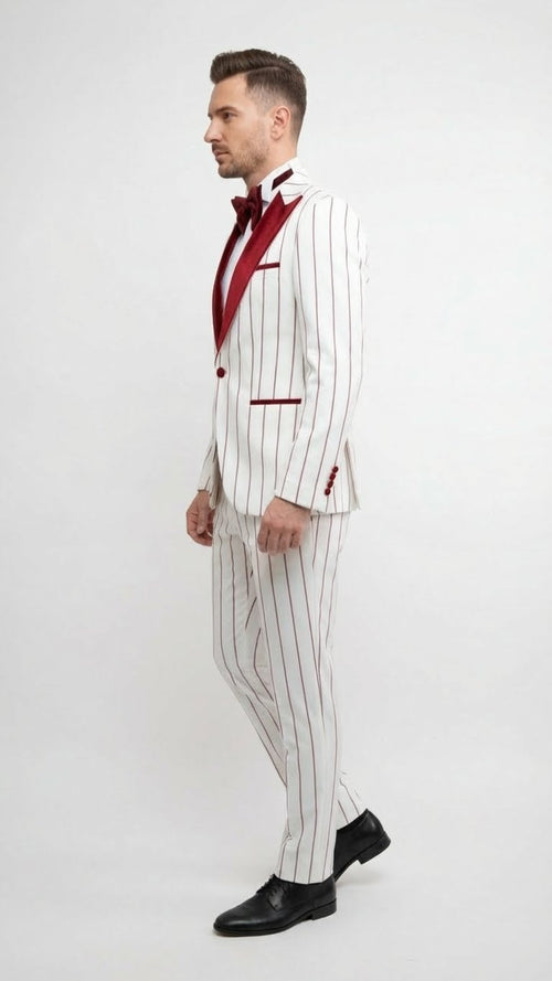 White tuxedo with red pinstripes. Velvet shawl lapel, structured jacket with breast pocket. Matching pinstripe trousers contour legs. Classic and elegant.
