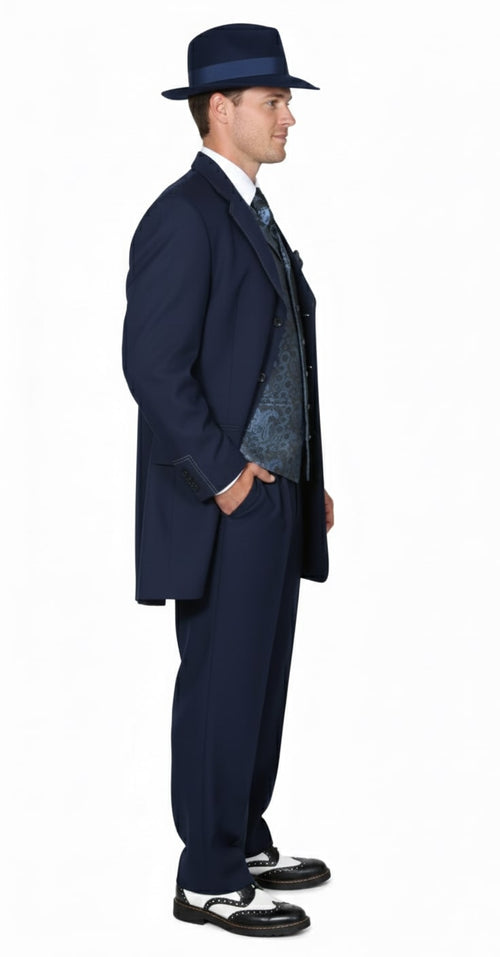 1920s-style navy zoot suit: long jacket, three-piece design with pleated pants. Smooth wool blend fabric, classic fit. Includes matching wide-brim hat. Waistcoat features darker blue paisley. Vintage aesthetic.