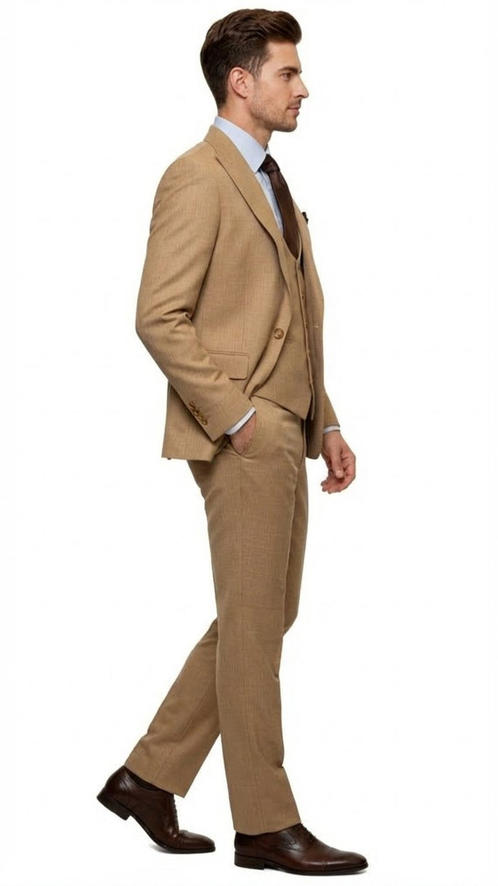 Tan three-piece men's suit with a modern, structured cut. Includes a fitted, single-breasted blazer with notch lapels, a matching vest, and straight-legged trousers. All in a cohesive tan textured fabric.
