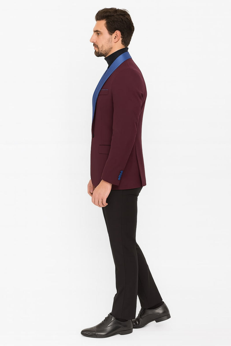 Men's burgundy tuxedo jacket with a fitted shape, blue satin shawl collar, and single-button front. Includes side pockets and three blue cuff buttons.
