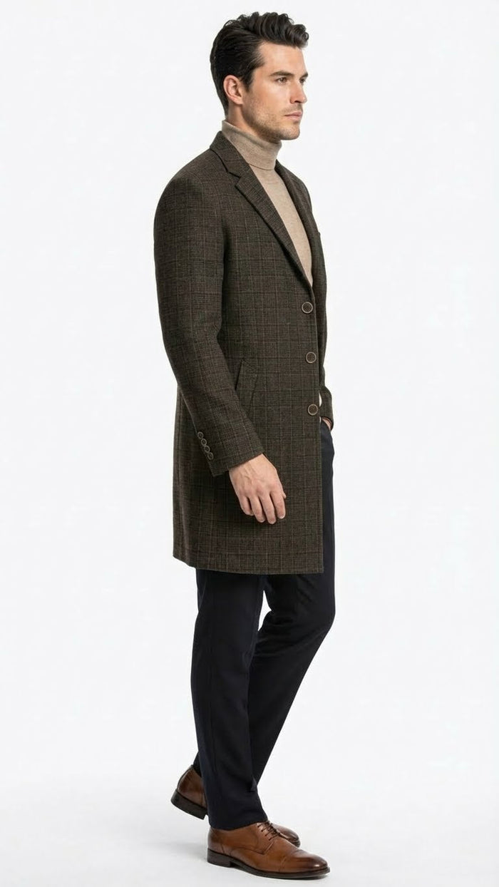 Men's brown checkered wool overcoat. Tailored fit, straight silhouette, notched collar, three buttons. Textured, subtle check pattern in darker browns. Mid-thigh length, long sleeves, buttoned cuffs.
