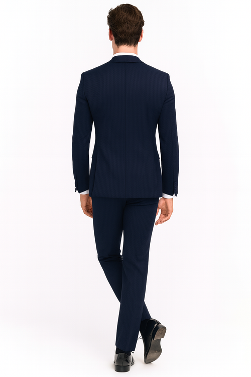 Navy blue men's tuxedo with satin peak lapel. Two-piece formal suit with a subtle pinstripe. Matching trousers. Smooth fabric.

