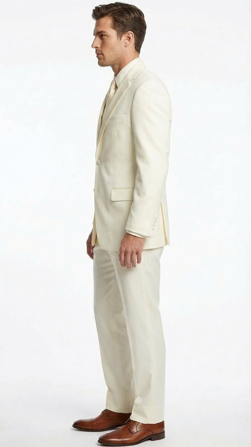 Ivory men's tuxedo suit with satin notch lapel. Structured silhouette featuring a blazer (single-button, two pockets) and tailored trousers. Lightweight fabric creates a formal look.
