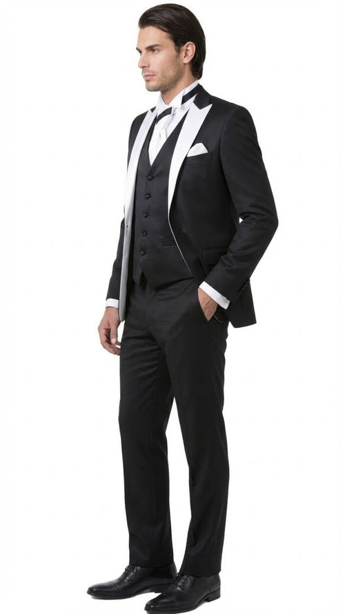 Men's black & white prom tuxedo suit. Includes a black vest with three buttons & pockets, white satin shawl collar, & black trousers. A classic formal look.
