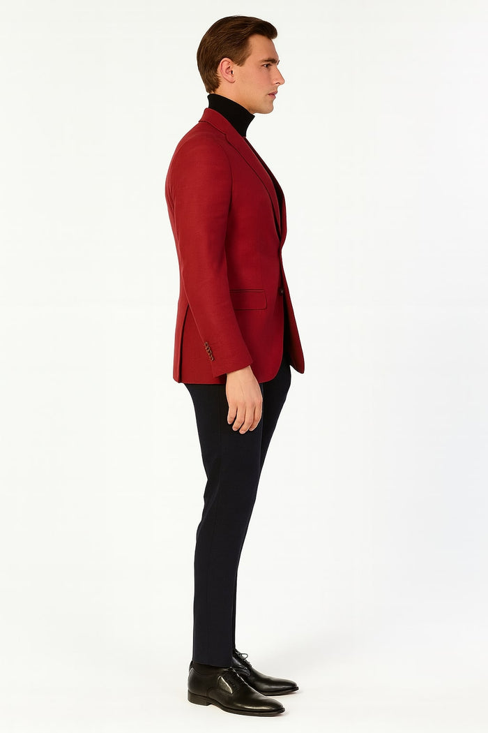 Men's burgundy sport coat. Tailored, single-breasted, two-button design. Smooth fabric, notched lapels, and side pockets. Structured with long sleeves, buttoned cuffs. Solid color, versatile for formal or smart-casual wear, offering a refined look.
