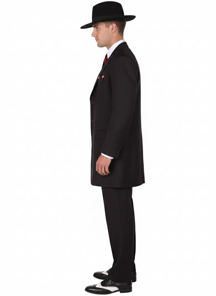 Black & red pinstripe zoot suit: long jacket, matching trousers, white shirt, red tie, black hat. Vertical stripes, straight cut, slight flare. Classic 1920s gangster style.