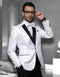White tuxedo with swirl pattern, black notch lapel, and pocket accents. Fitted jacket with a matching vest. Elegant and stylish.
