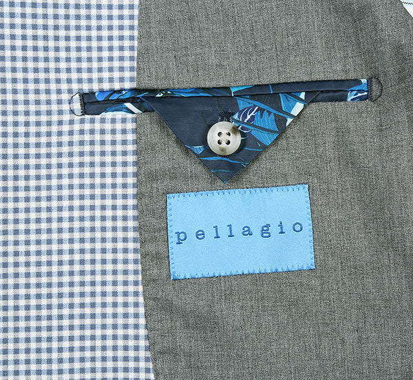 Sage blue check slim-fit blazer with a left breast pocket (triangular flap & button). Gray fabric and light blue "pellagio" label complete the design.
