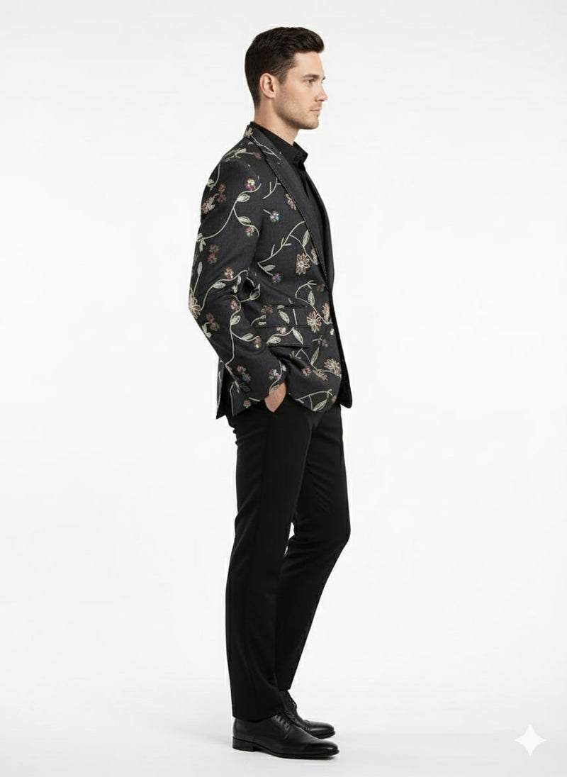 Elegant black blazer with vibrant floral embroidery. Single-breasted design, structured silhouette, wide lapels, and tailored back. Perfect for special occasions.
