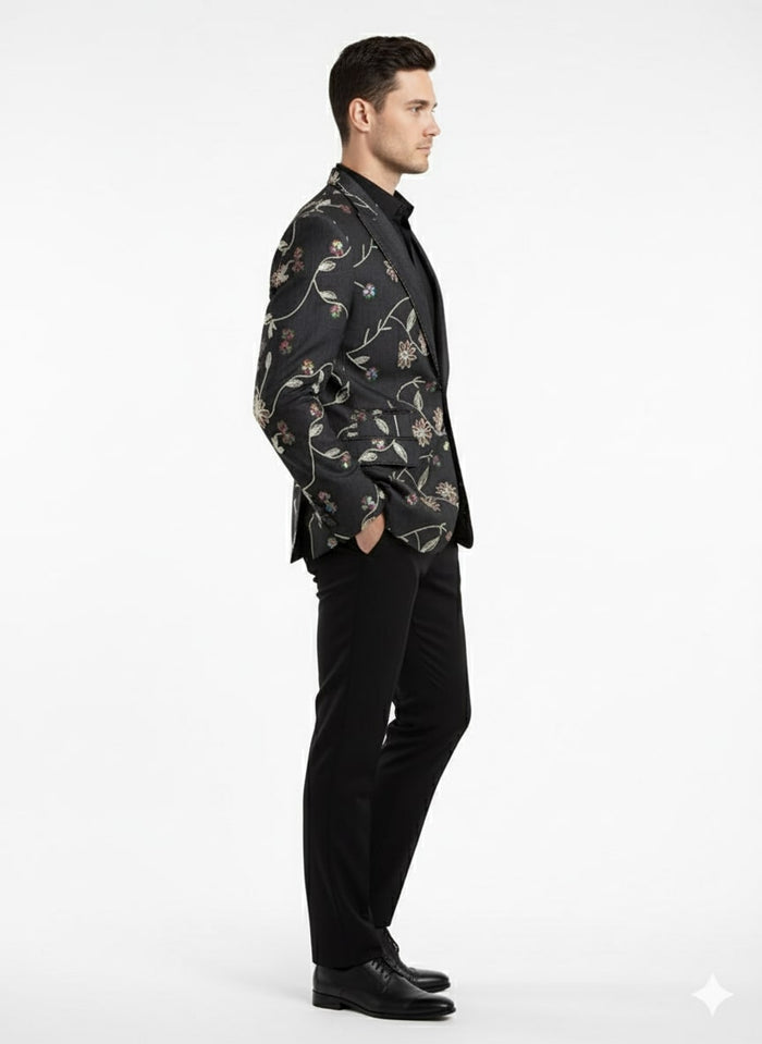Elegant black blazer with vibrant floral embroidery. Single-breasted design, structured silhouette, wide lapels, and tailored back. Perfect for special occasions.
