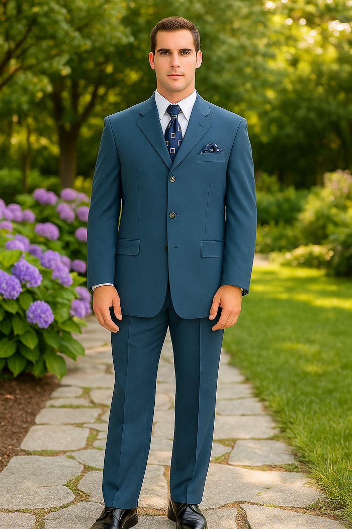 Alberto Nardoni men's steel blue suit: three-button closure, tailored fit, structured shoulders. Solid fabric jacket & matching trousers. Chest pocket with pocket square. Visible stitching.
