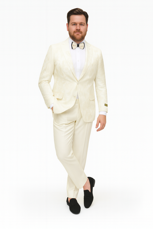 Ivory floral embroidered tuxedo jacket with matching pants. Cream color, intricate floral patterns. Includes white shirt, bow tie. A cohesive, elegant ensemble.
