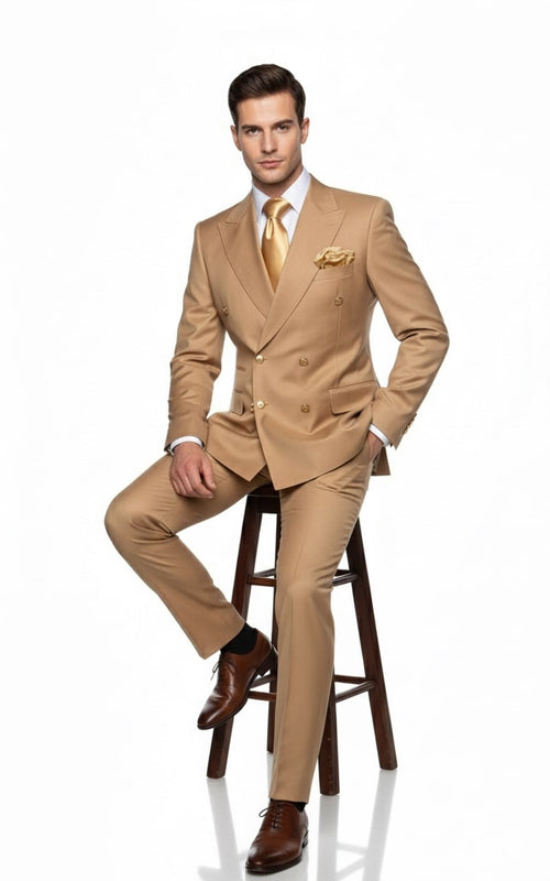 Khaki bronze men's double-breasted suit with gold buttons. Tailored fit, slim trousers. Includes light gold tie, pocket square, and brown dress shoes. Smooth, structured material suggests formal wear.
