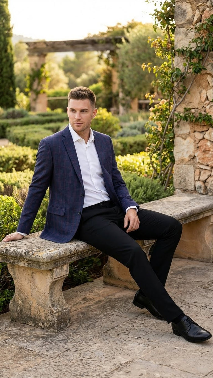 Navy big and tall men's jacket with burgundy plaid. Structured silhouette, notched lapel, two pockets. Woven fabric, smooth texture.
