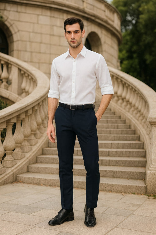 Men's white linen button-down shirt. Long sleeves (rollable), classic collar, straight cut. Light texture for a relaxed, breathable feel.
