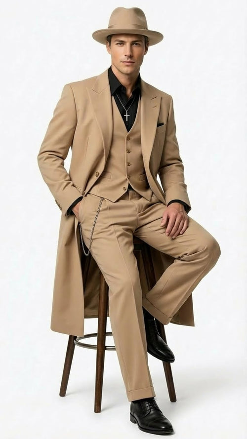 Alberto Nardoni's 1920s beige zoot suit: tailored, broad shoulders, long coat, tapered pants. Features a three-button vest, black shirt, peaked lapel, and chain. Includes wide-brimmed hat, black shoes.