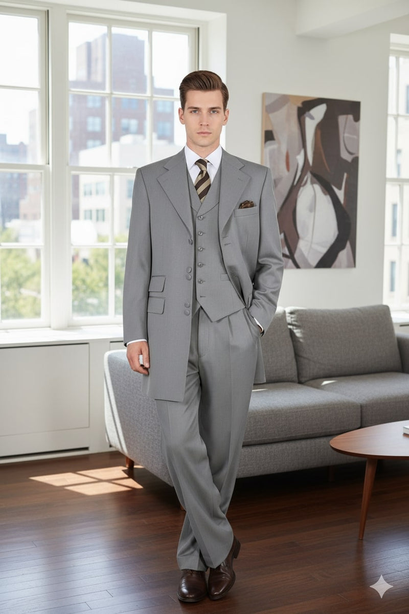 Light gray three-piece suit: long jacket with wide lapels & front pockets, vest with 3 buttons & notched neckline, and straight-leg trousers. Smooth, tailored fabric. Classic design.