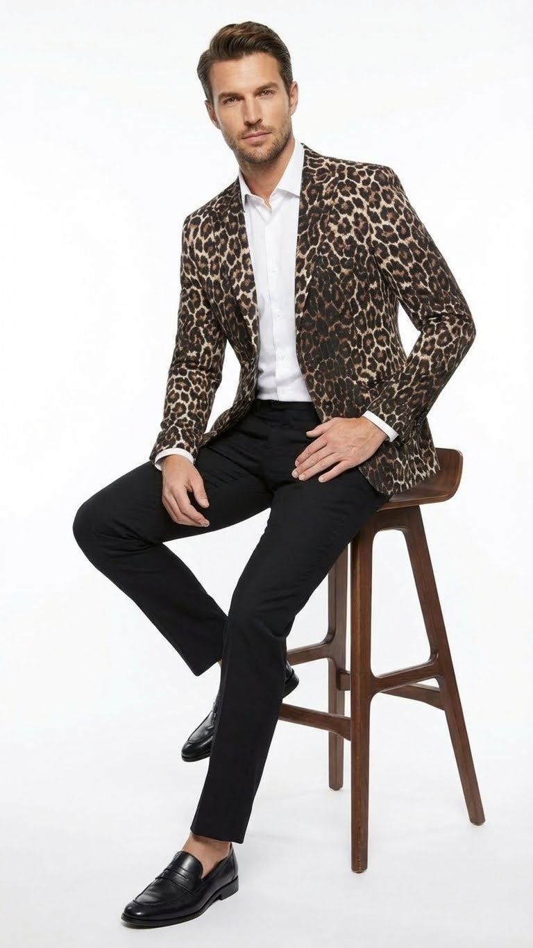 Alberto Nardoni men's leopard print blazer: fitted, single-breasted, brown/black pattern. Notched lapels, two pockets. Worn over white shirt. Structured, tailored fit with buttoned long sleeves.

