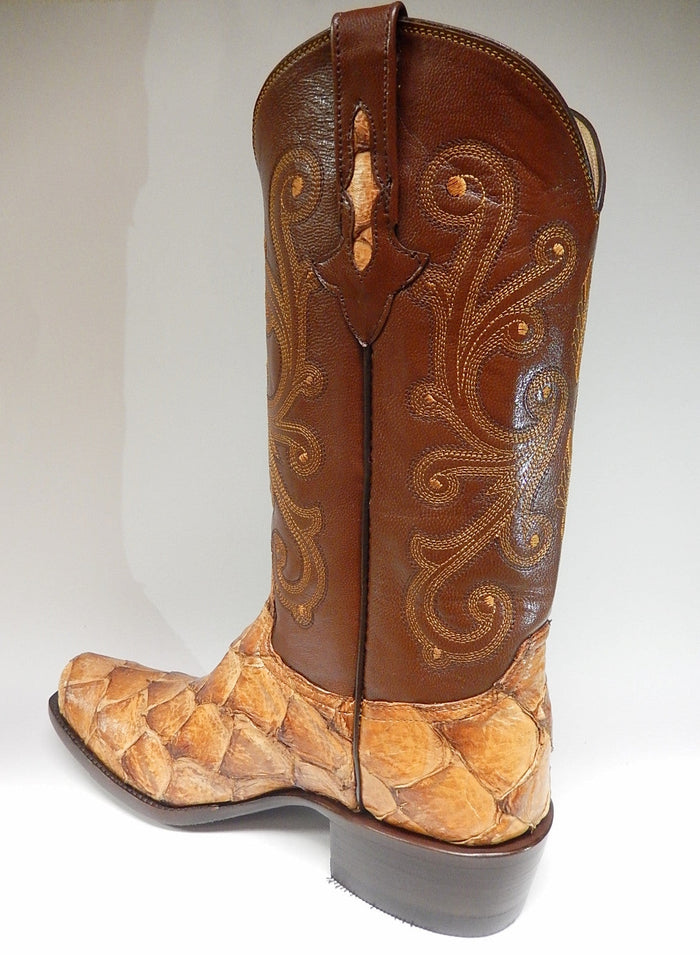 Alberto Nardoni Safari pirarucu cowboy boots: tall, rounded toe. Brown leather upper with decorative stitching, lighter tan fish scale-like foot. Black sole, slight heel, pull tabs.
