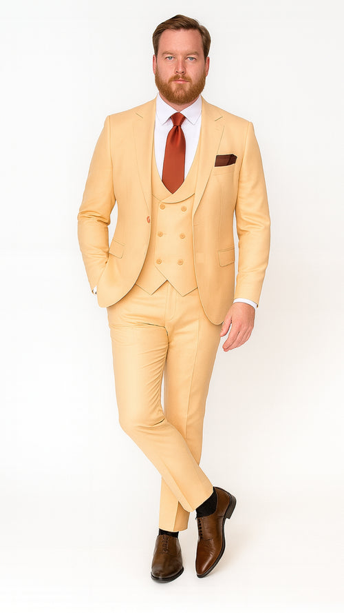 Light peach men's three-piece suit. Slim fit blazer & pants with a smooth finish, notch lapel blazer and double-breasted vest. Vest features three buttons, echoing the blazer.
