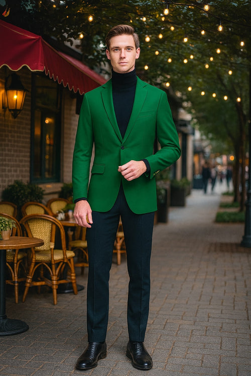 Alberto Nardoni men's green blazer: tailored, fitted, lightweight fabric. Single-breasted, notch lapel, single button. Long sleeves with cuffs, paired with dark fitted trousers for contrast.
