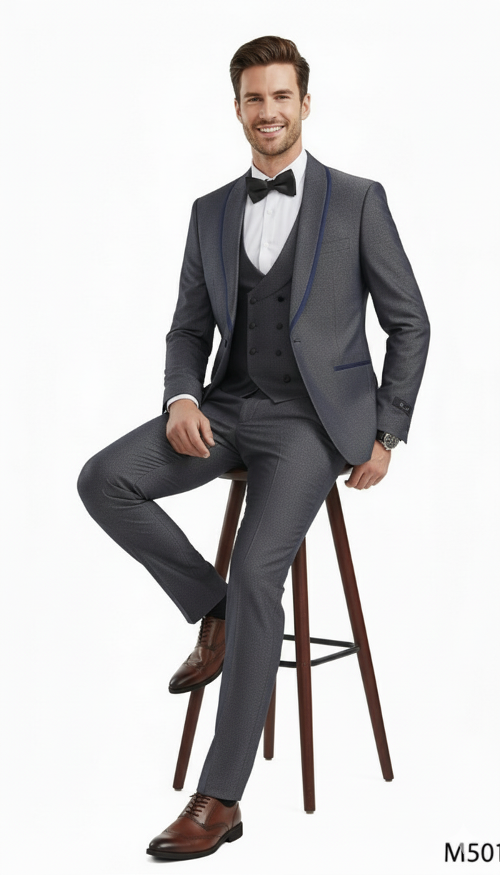 Charcoal gray slim-fit three-piece suit with blue lapel trim. Includes double-breasted vest and tailored pants. Textured fabric and modern silhouette for a harmonious look.
