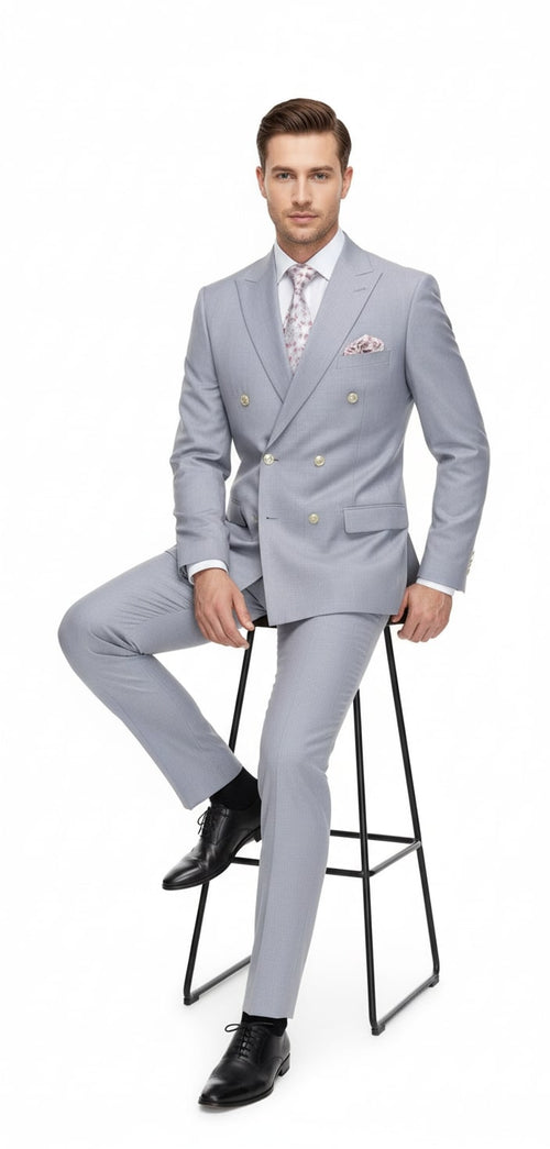 Silver grey 3-piece suit: double-breasted blazer with structured fit and button rows, matching tailored trousers, and vest. Smooth, slightly textured fabric. Classic, formal design.