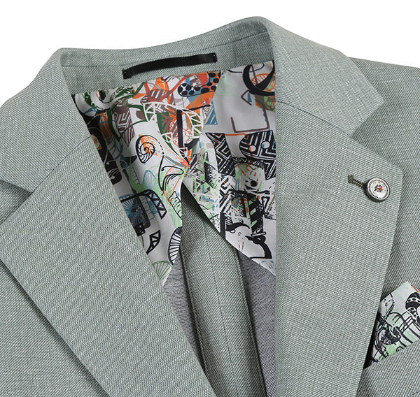 Light sage gray slim-fit blazer with a structured collar. Half canvas construction, patterned lining, and a decorative lapel pin.
