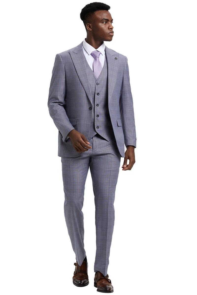Stacy Adams men's light grey vested suit. Windowpane plaid, one-button jacket with peak lapel. Includes matching vest and tailored pants. Lightweight fabric for a clean, structured fit.
