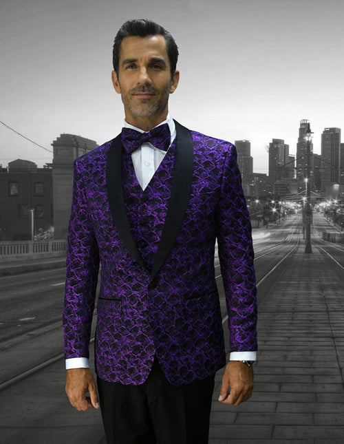Purple tuxedo with floral pattern, shawl lapel, and black satin details. Textured material provides a vivid visual.
