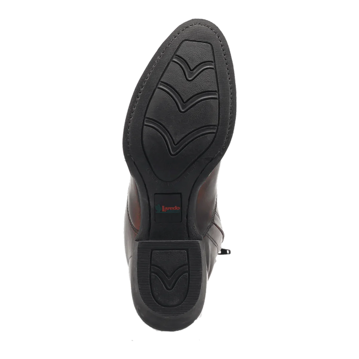 Laredo Men's Fletcher boots: black leather, round toe. Durable black rubber outsole with textured surface and a flat, rounded shape, featuring a distinct tread pattern.
