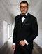 Men's black wool tuxedo. Modern fit, 2-button jacket with satin shawl collar and side pockets. Includes matching vest, black trousers, cuff buttons, and satin bow tie.
