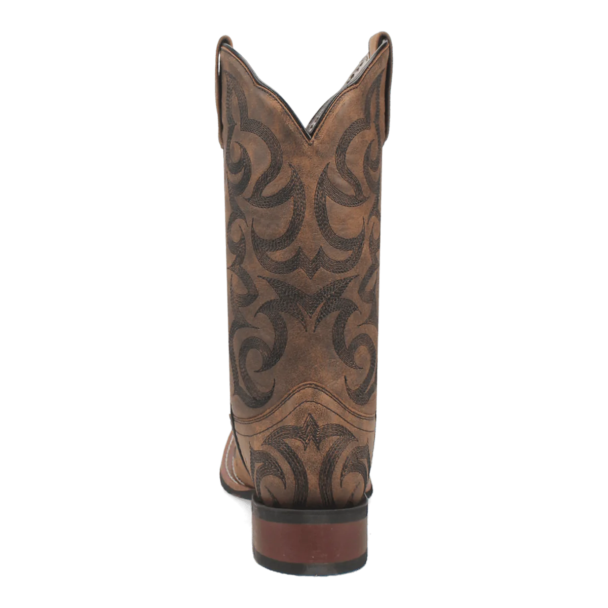 Laredo Sariah boot. Tall brown leather shaft with pointed top and decorative stitching. Intricate swirling patterns for contrast. Stacked heel, rounded toe.
