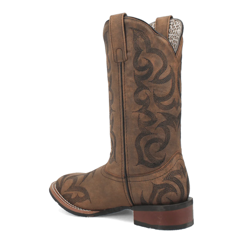 Laredo Sariah boot: Tall, rounded brown leather shaft. Intricate black stitching, pointed toe, and leather sole with a low heel. Features animal print lining.
