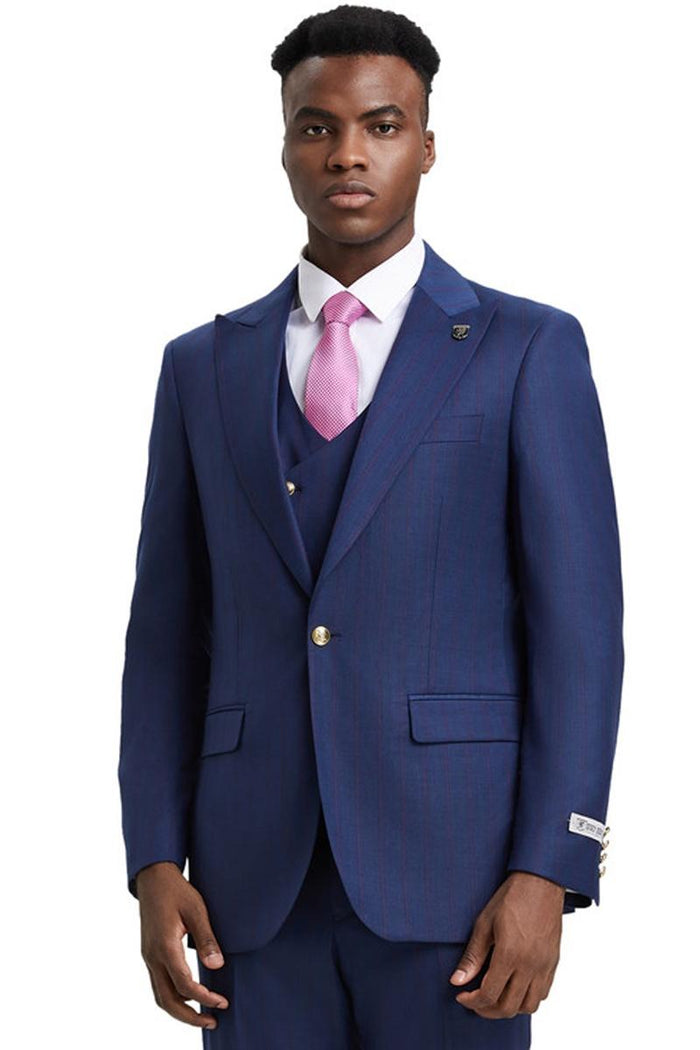 Navy blue Stacy Adams one-button suit with subtle pinstripes. Features a side peak lapel, two front pockets, and a matching vest. Tailored, fitted design for formal events.
