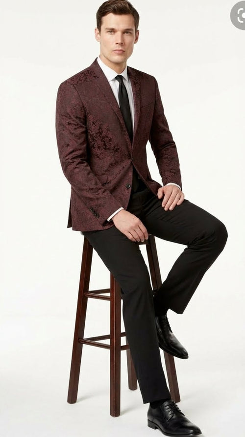 Men's burgundy velvet blazer with floral paisley pattern. Single-button closure, tailored fit. Elegant and stylish sport coat.
