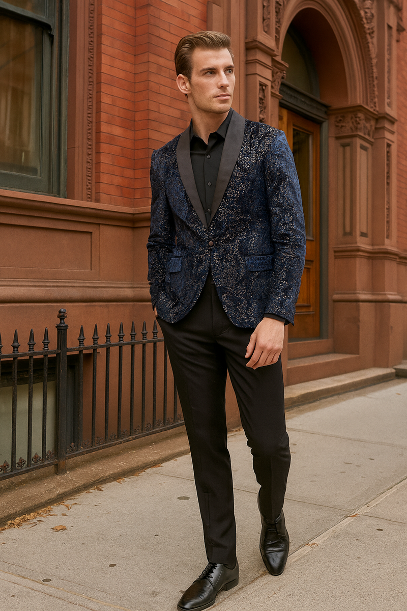 Navy sequin tuxedo jacket for men. Black satin shawl lapel, fitted silhouette, two front pockets. Shimmering, textured surface.
