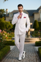 Alberto Nardoni men's white 3-piece suit. Double-breasted jacket, matching trousers, and vest. Tailored silhouette with smooth fabric and a contrasting pocket square, showcasing classic suit design.